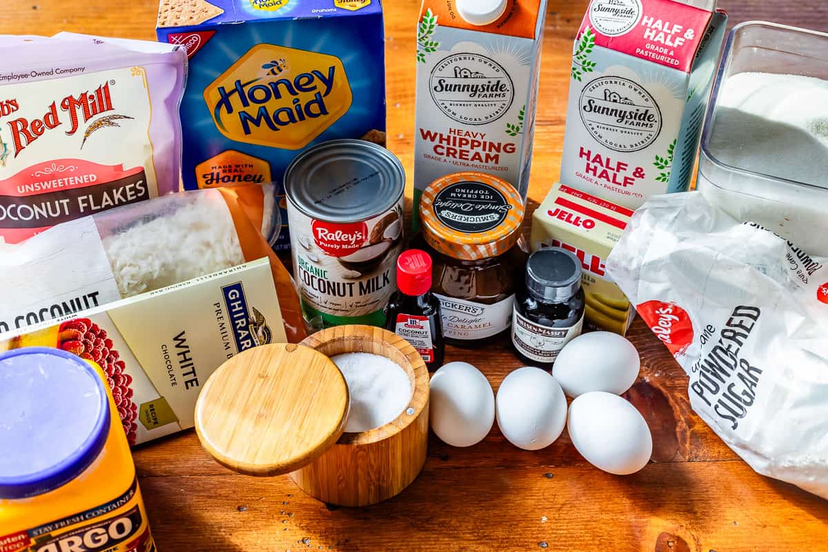 ingredients needed for the pie - coconut milk, coconut flakes, graham crackers, and more.
