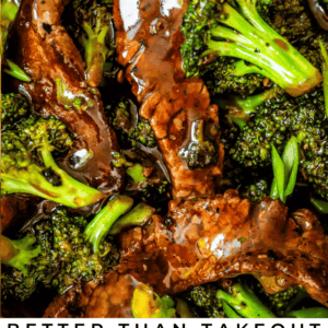 Close up of beef and broccoli with sauce.