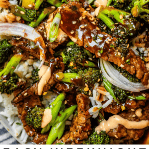 beef with broccoli on a plate with rice, shallots, and sriracha mayo.