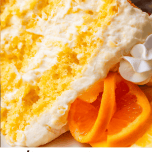 pinterest image slice of cake sideways on a plate with text "dreamy creamy sunshine cake".