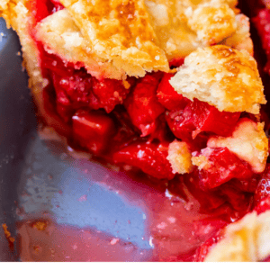 pinterest image of a slice of strawberry rhubarb pie with text "summer's best strawberry rhubarb pie".