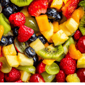 pinterest image of fruit salad with text "tips for the best fruit salad".