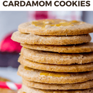 A close-up of a stack of Crispy Swedish Cardamom Cookies with golden brown edges, set against a blurred background, with the text Swedish Cardamom Cookies at the top.
