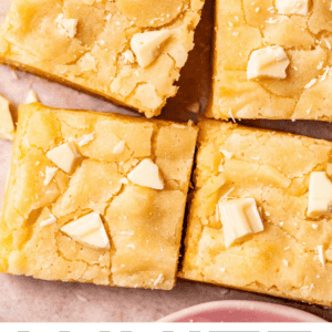 overhead shot of white chocolate brownies cut into squares.