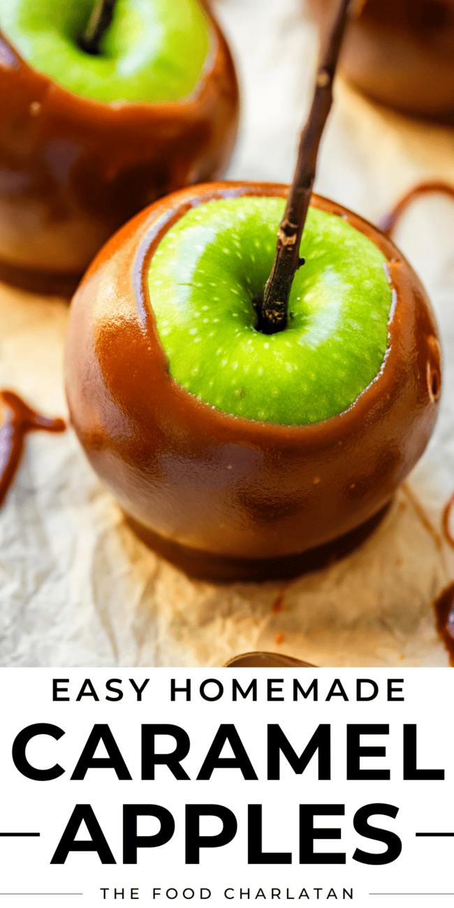 Green apple dipped in caramel with a stick in the center.