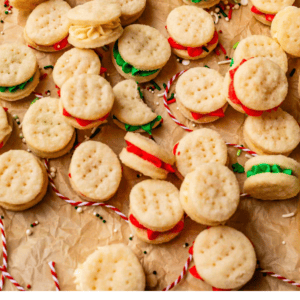 pinterest image of dozens of small cookies with text "vanilla cream wafers".