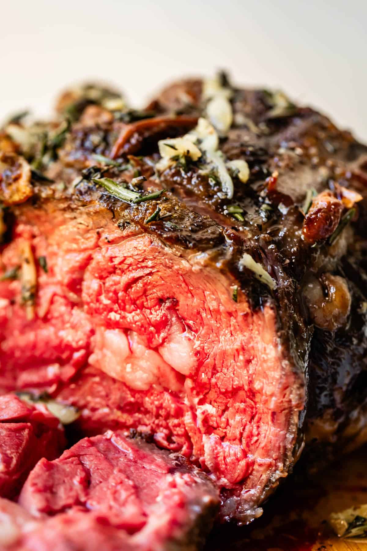 Cross section of red meat from prime rib deliciously cooked.
