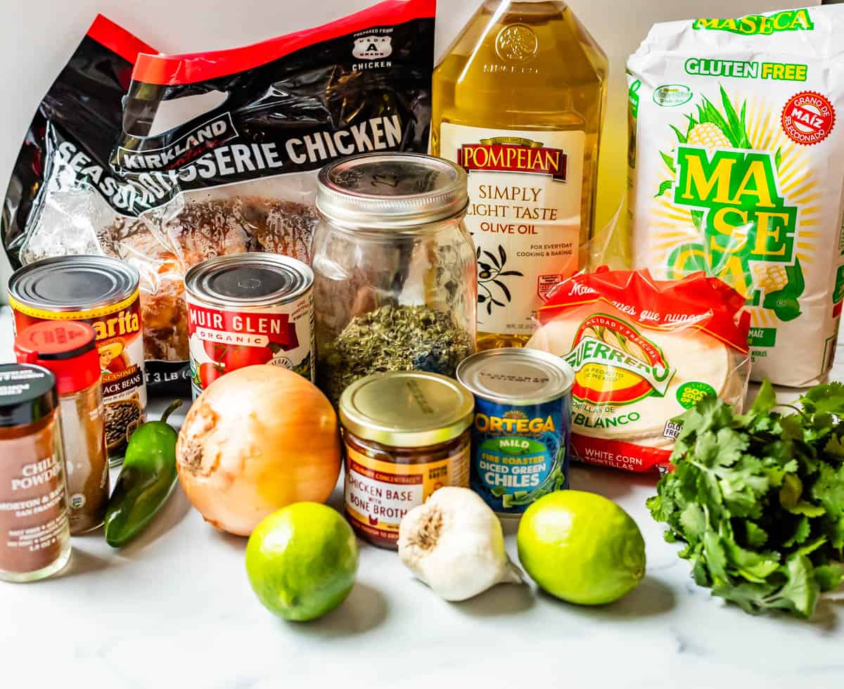 photo of the ingredients for chicken tortilla soup with things like chicken, maseca, and more.