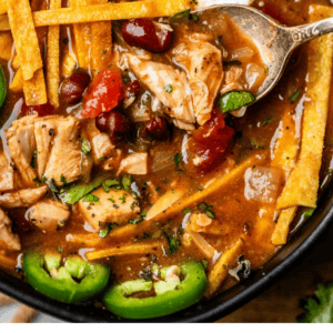 Pinterest image of soup with text "perfect chicken tortilla soup".