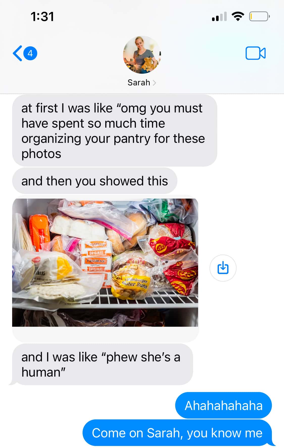 screenshot of text thread with picture of an open freezer.