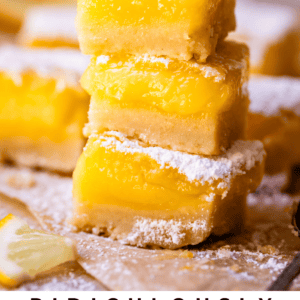 pinterest image of stack of three lemon bars with text "ridiculously tart lemon bars".