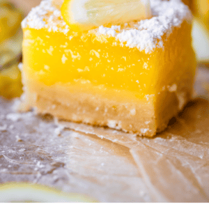 pinterest image of lemon bar with text "lemon bars the absolute best".