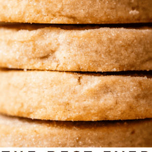pin image with close up of round shortbread cookies.