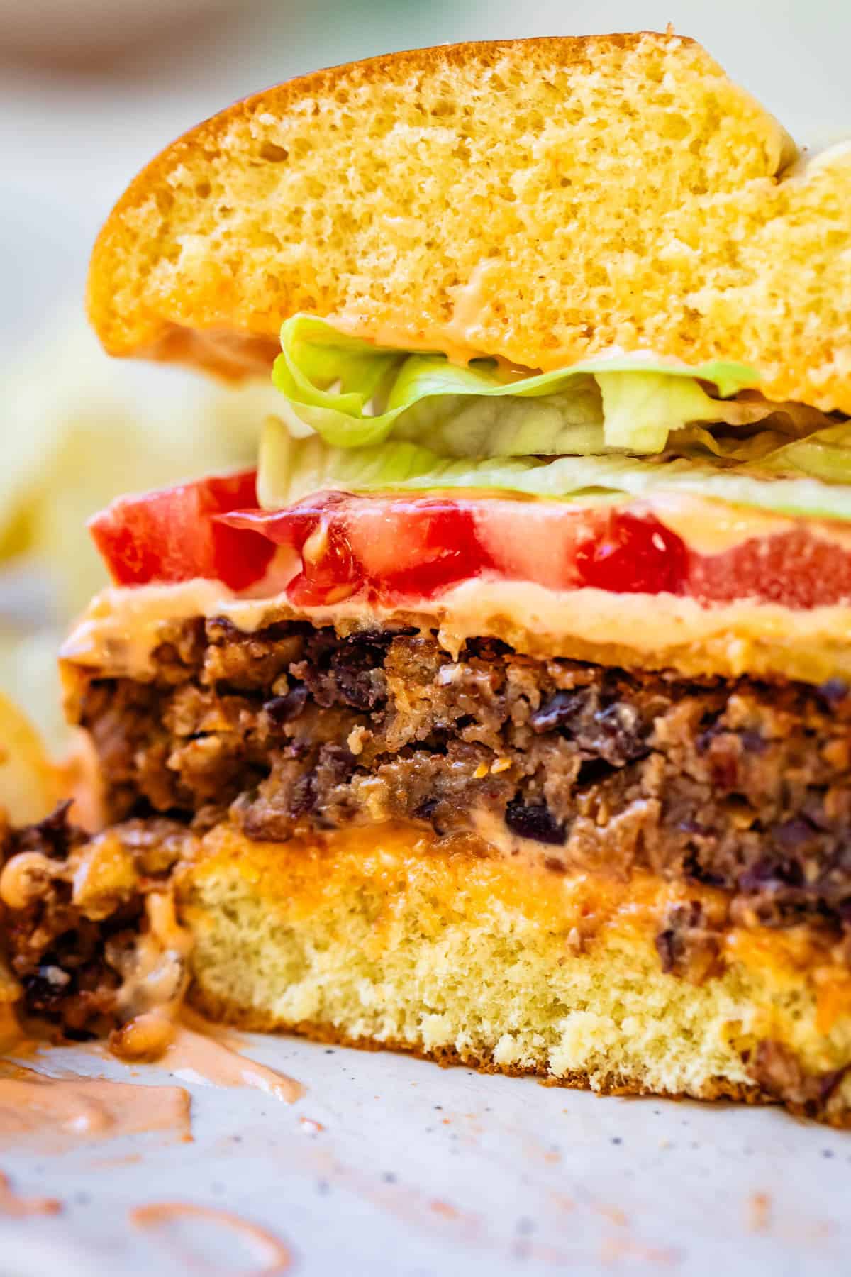 a black bean burger sliced in half.