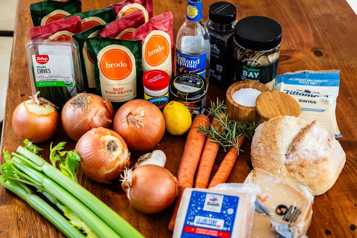 ingredients for french onion soup like onions, beef broth, bread, cheese, and more.