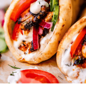 pinterest image of chicken shawarma with text "easy homemade chicken shawarma".
