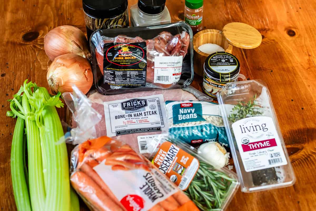 ingredients for ham and bean soup like onions, celery, carrots, ham, etc.