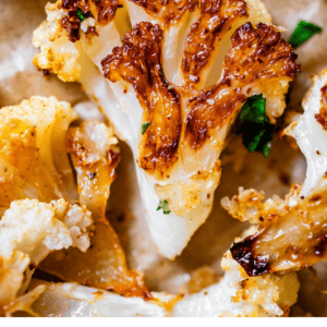 pinterest image of roasted cauliflower with text "easy roasted cauliflower".