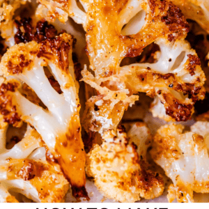 pinterest image of cauliflower with text "how to make roasted cauliflower crispy & browned".