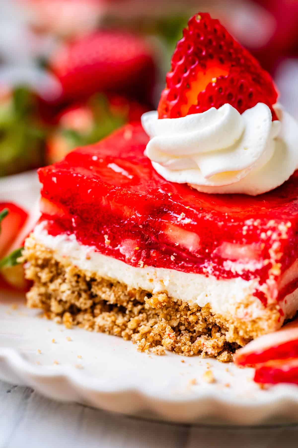 a slice of strawberry jello pretzel salad.