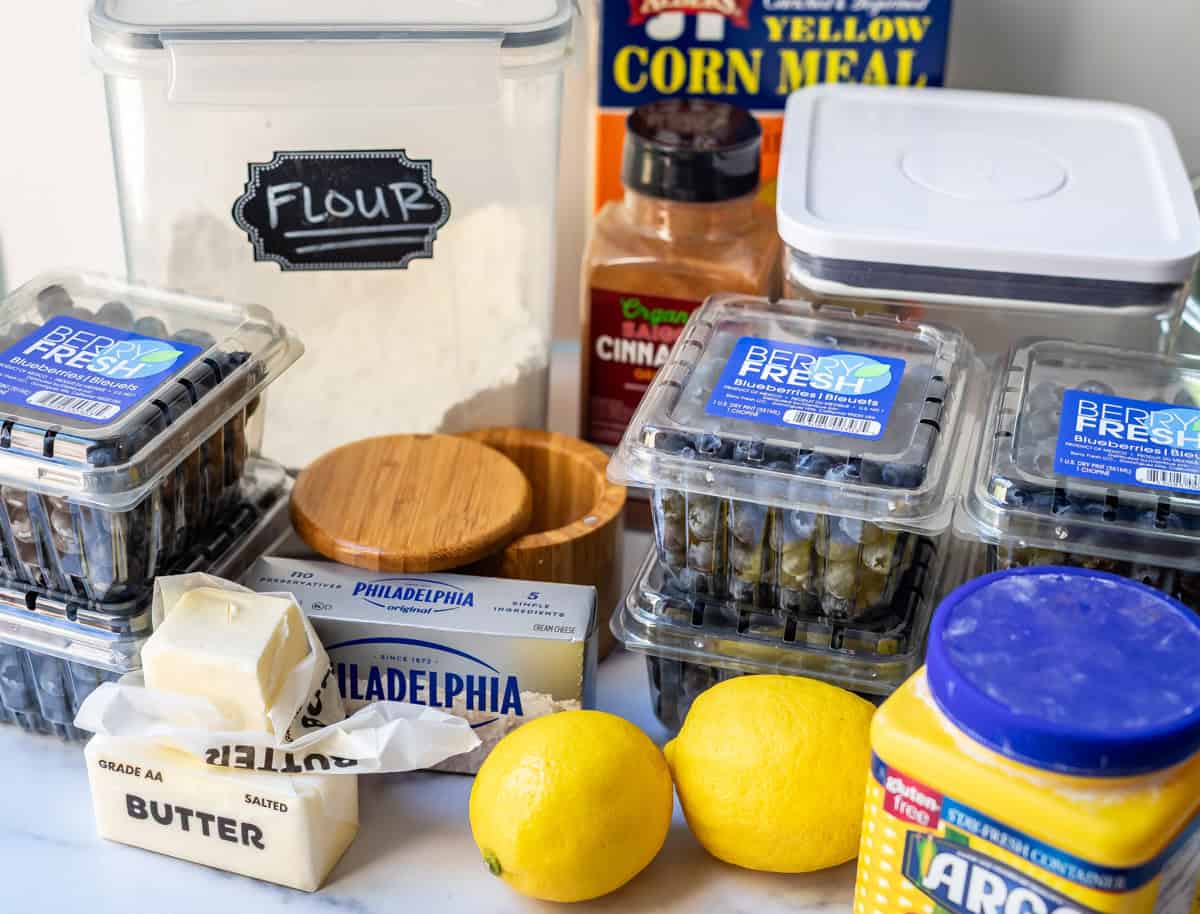 ingredients for blueberry pie like flour, sugar, cornstarch, lemons.
