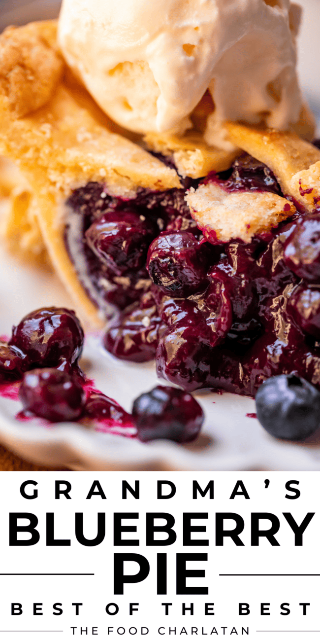 slice of juicy blueberry pie with ice cream on top.