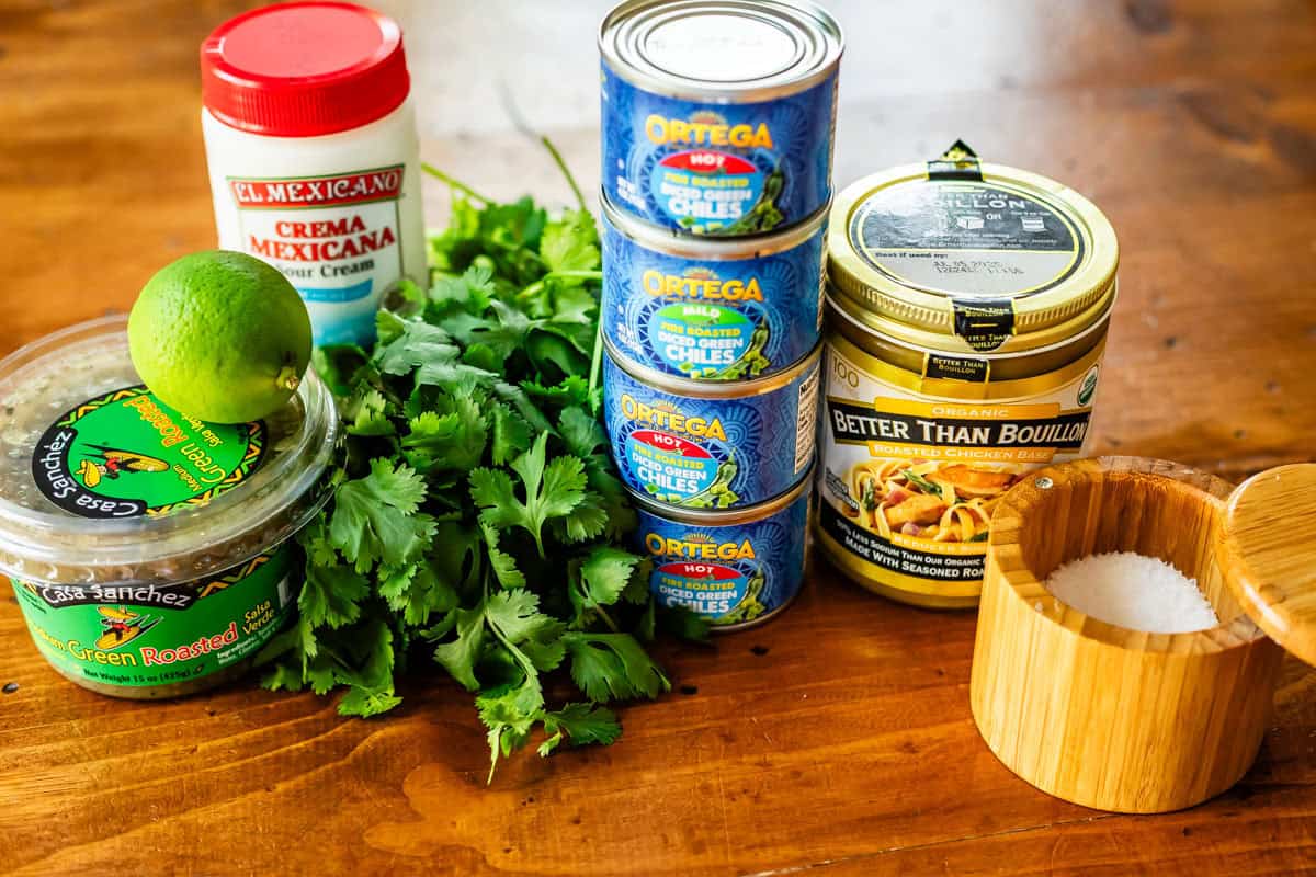 ingredients for green enchilada sauce using store bought ingredients like cans of green chiles and salsa verde.