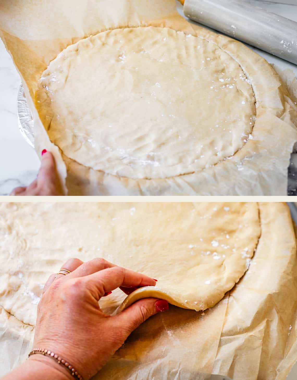cookie dough pressed into a pizza pan lined with parchment paper; held up to show thickness.