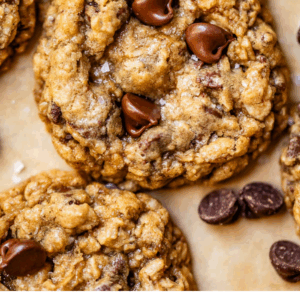 pinterest image of cookies with text "the literal best oatmeal chocolate chip cookies".