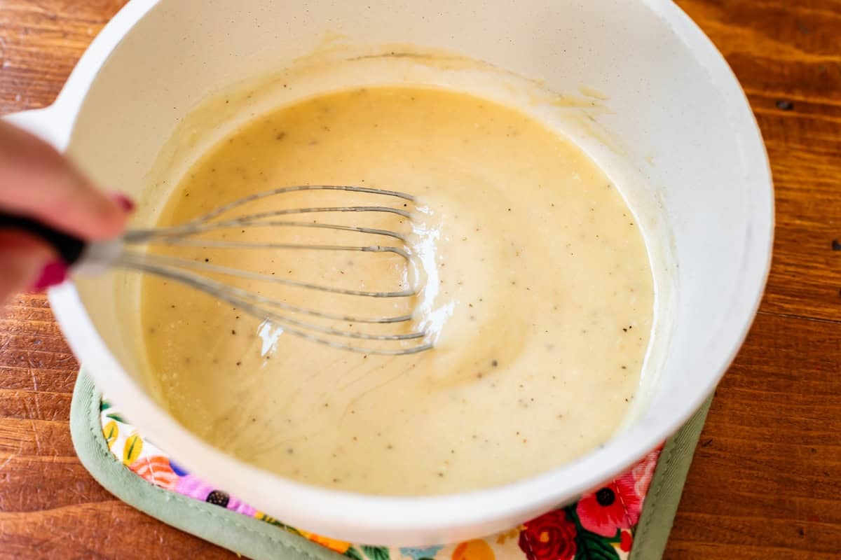 flat whisk in the finished, creamy white sauce with no lumps.