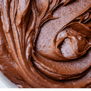 pinterest image of frosting with text "ridiculously chocolate butter cream frosting".