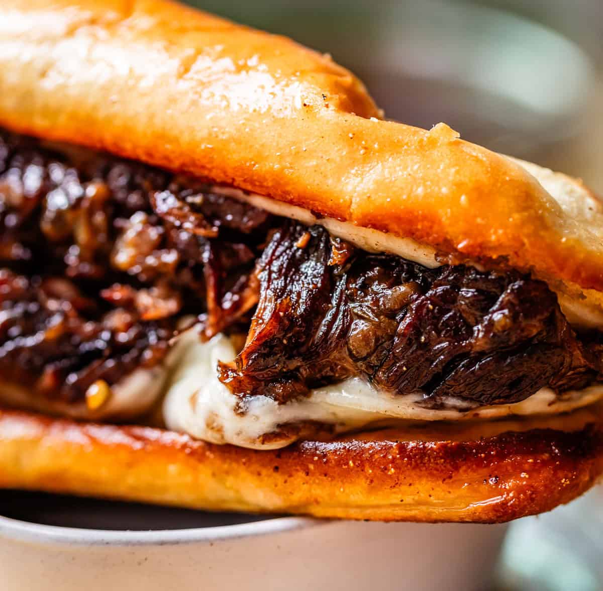 A French Dip sandwich piled high with tender chuck roast and provolone cheese.
