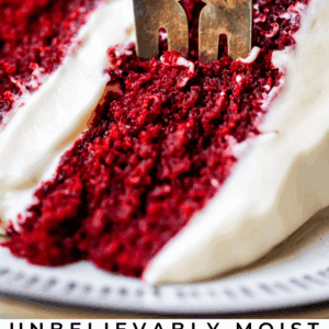pinterest image of lit candle in cake with text "unbelievably moist red velvet cake".