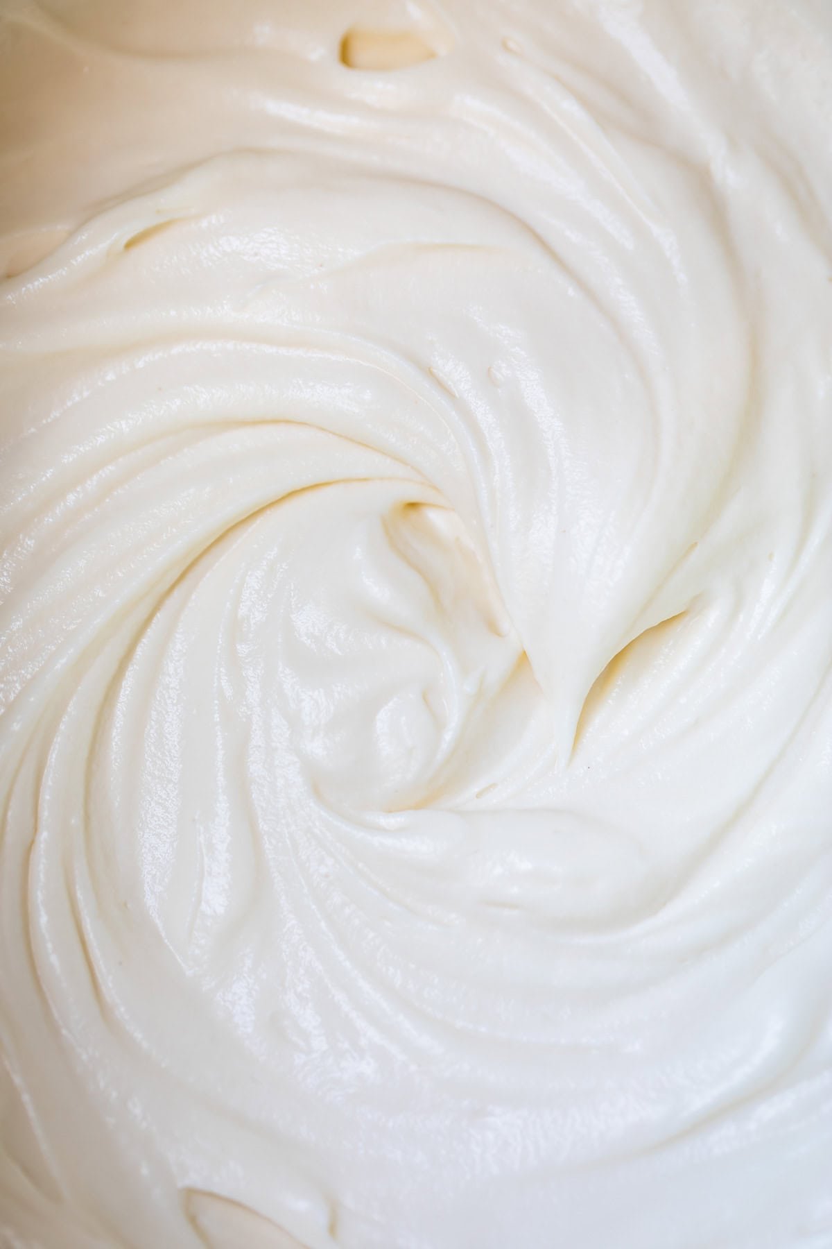 cream cheese frosting with the consistency of whipped cream.