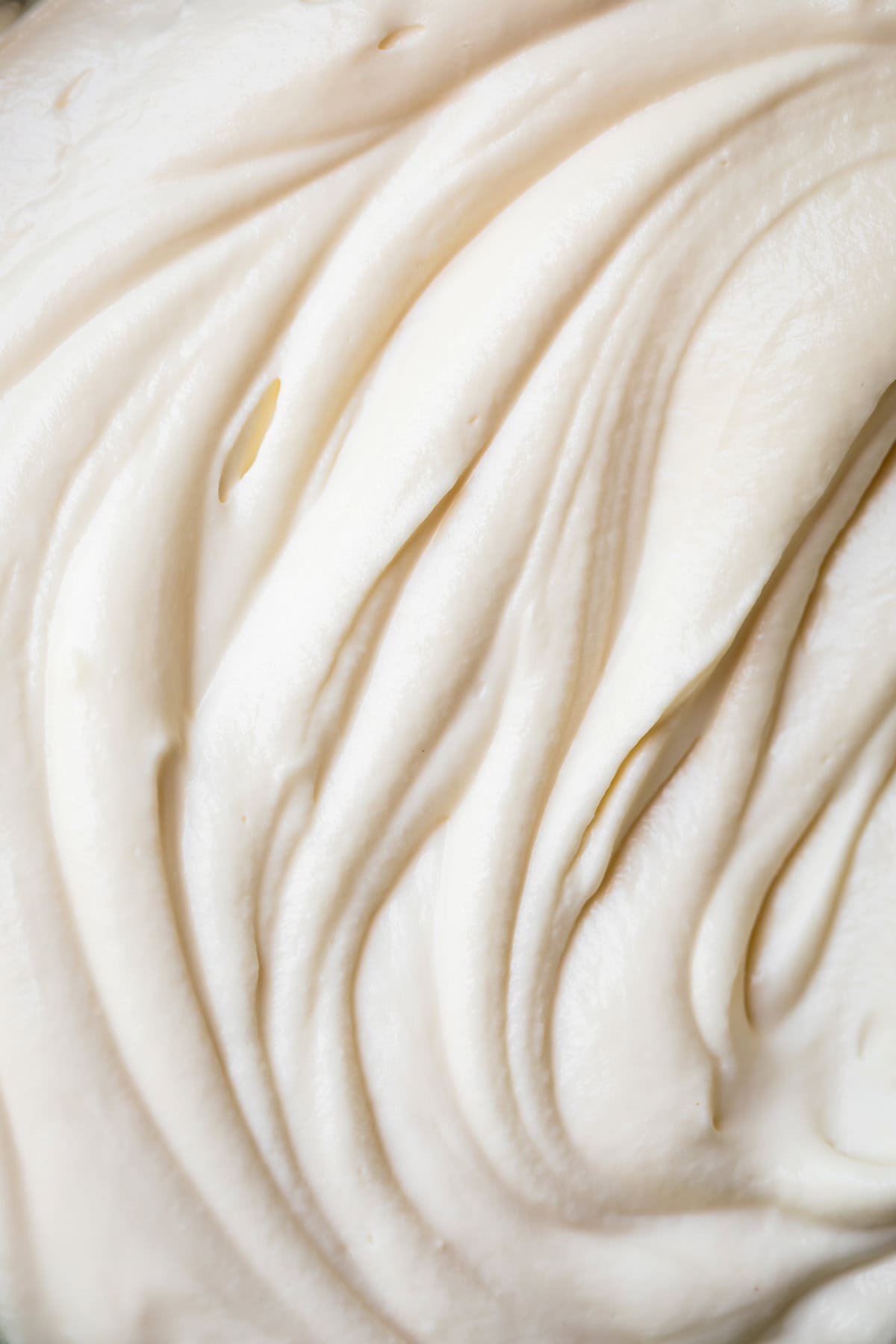 cream cheese frosting with the consistency of whipped cream.
