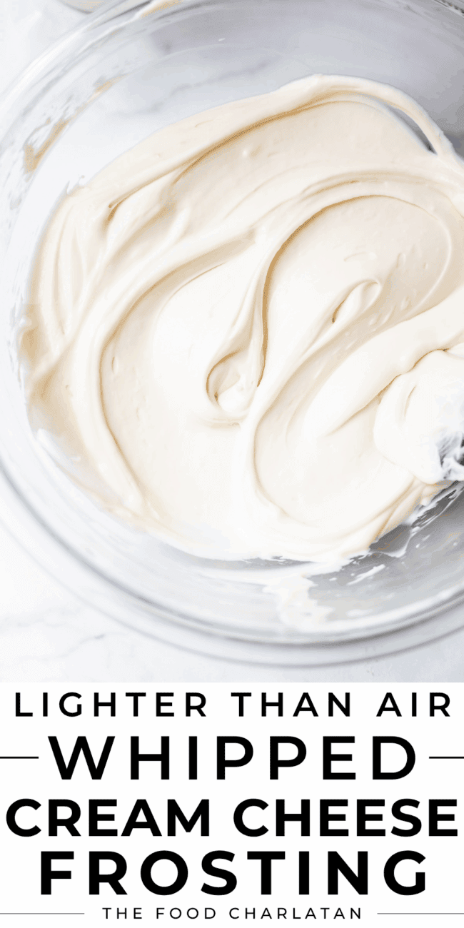 cream cheese frosting swirled in a bowl shot from overhead.