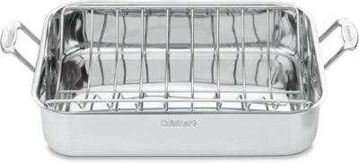 A shiny stainless steel Cuisinart roasting pan with a removable metal rack and two handles.