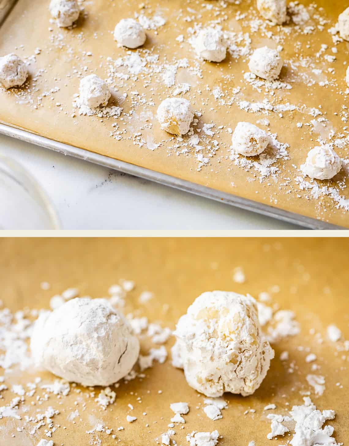 Dough balls coated in powdered sugar are placed on a parchment-lined baking sheet, ready to be baked. A close-up below shows two dough balls with powdered sugar scattered around them.