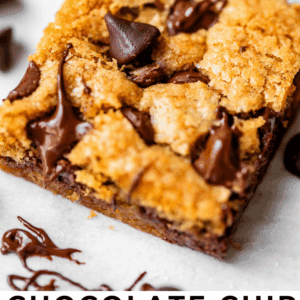 A close-up of a chocolate chip cookie bar topped with chocolate chips, showing a chewy texture. Text below reads: Chocolate Chip Cookie Bars that bake flat (no ridged edge) The Food Charlatan.