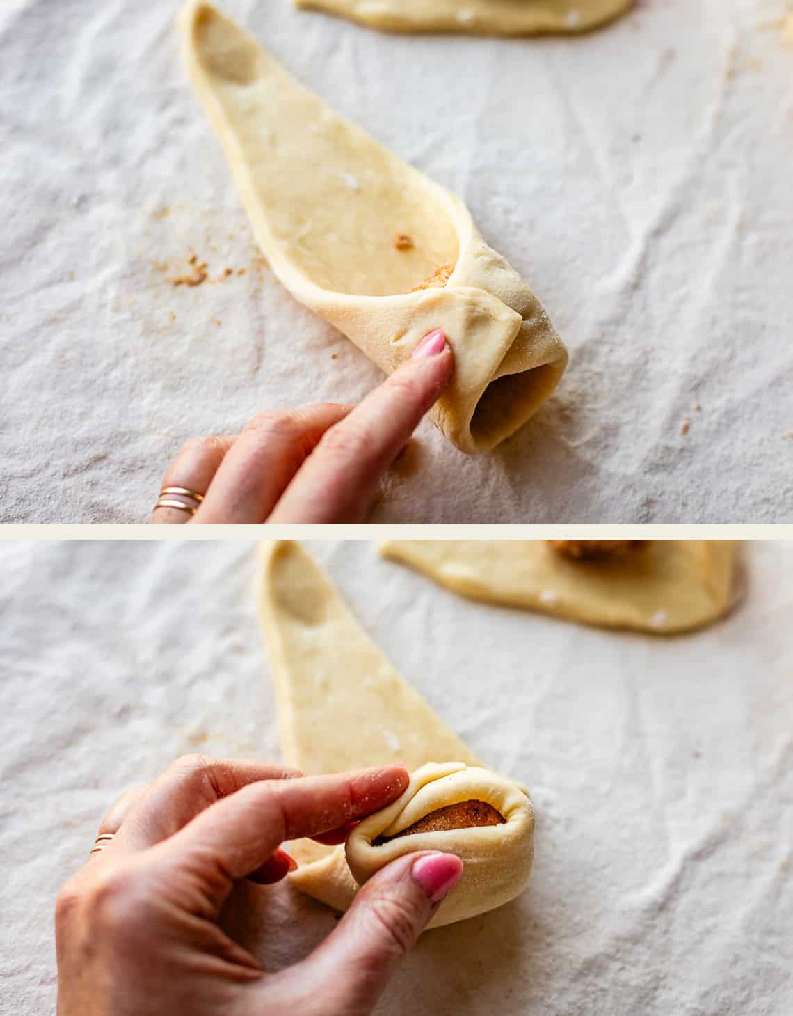 A hand with a ring folds dough around a filling on a lightly floured surface, showing the process in two steps: starting the roll and folding the end over.