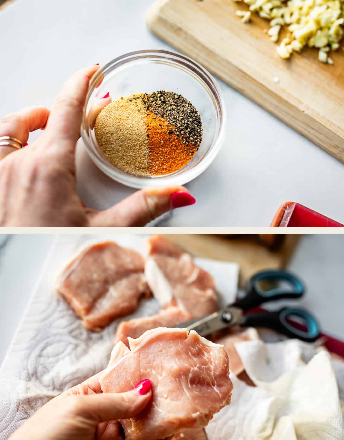 A hand holds a small bowl of mixed spices above a white counter, with chopped ingredients nearby; below, raw pork chops are held and prepared with scissors on a paper towel.