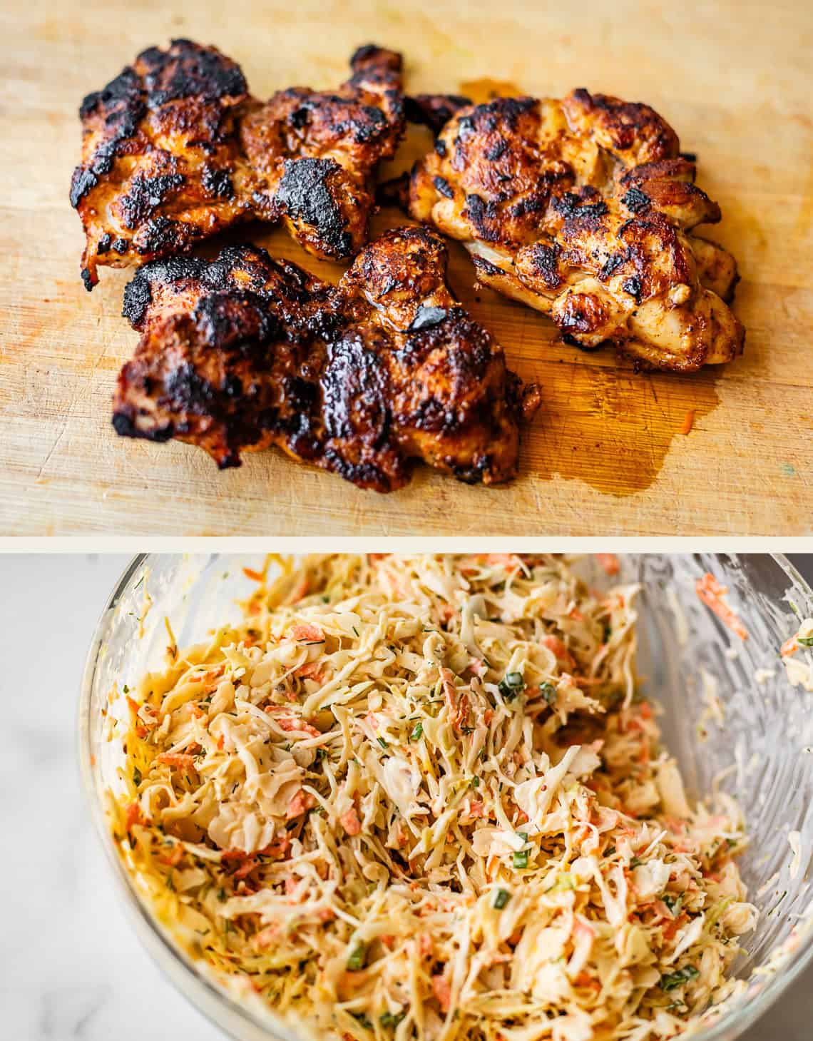 Grilled, charred chicken thighs resting on a wooden board above a bowl of creamy coleslaw with shredded cabbage, carrots, and herbs.