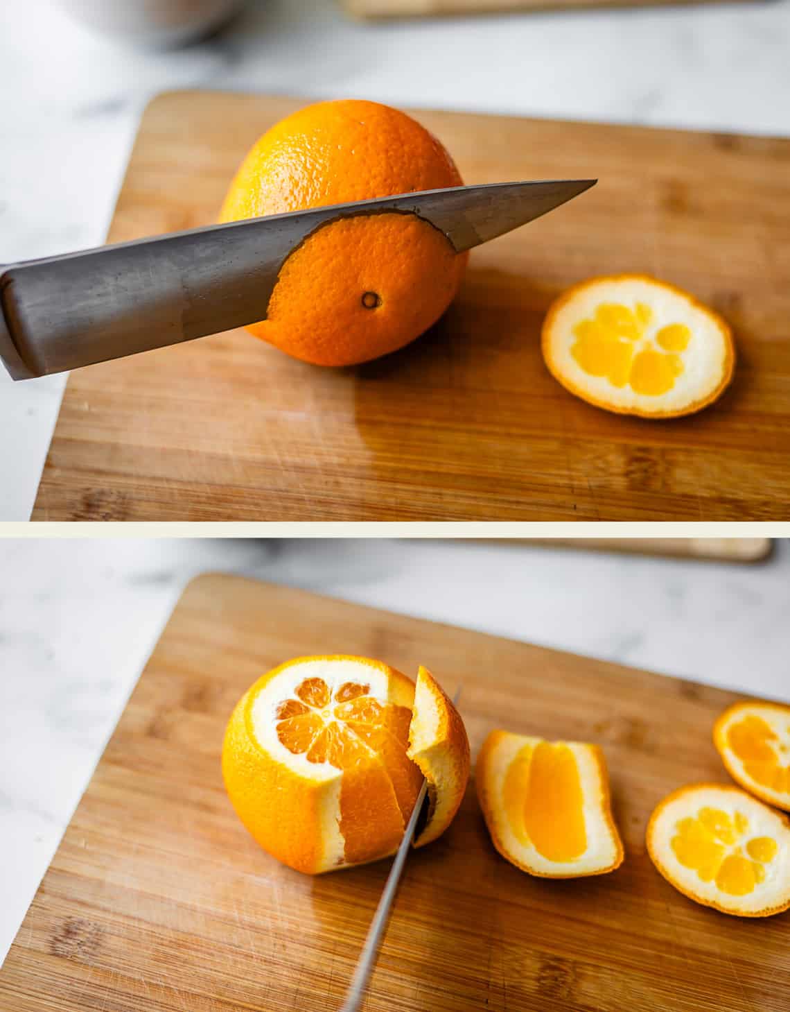A knife slices the peel off an orange on a wooden cutting board; the orange is being peeled in sections, with slices of peel set aside.