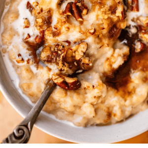 A bowl of oatmeal topped with butterscotch, pecans, and cream, with text below reading 10-Minute Butterscotch Oatmeal.